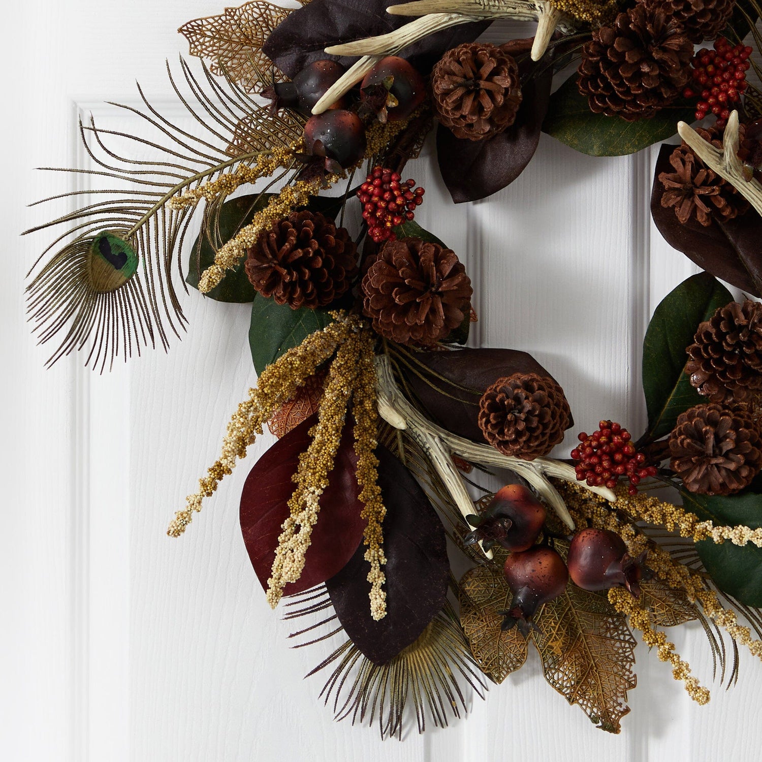 27” Magnolia Leaf, Berry, Antler and Peacock Feather Artificial Wreath